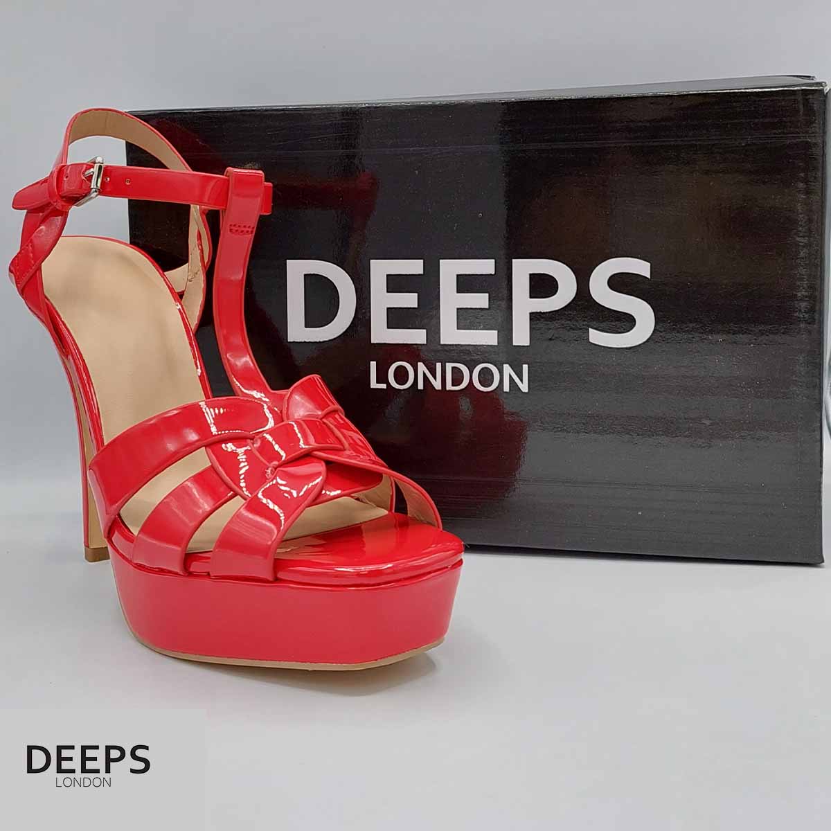 Front view of women's Zenith platform T-bar stiletto sandals with 11cm heel in red patent, statement London style from DeepsLondon.